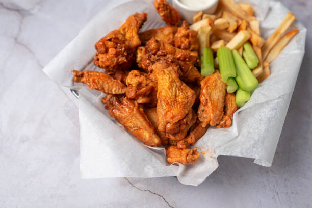 istock Buffalo chicken wings with celery and dip 1469014637
