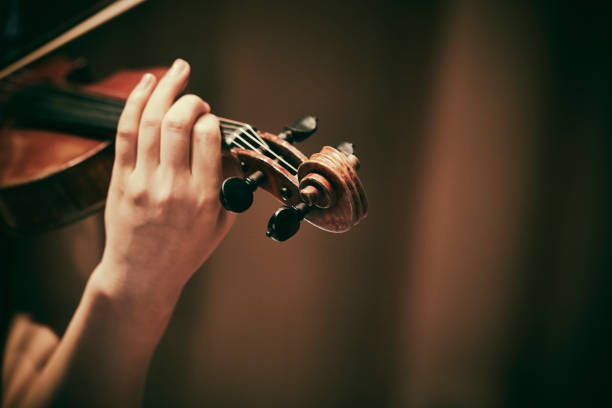 istock Close-up of hands playing the violin 1469014781