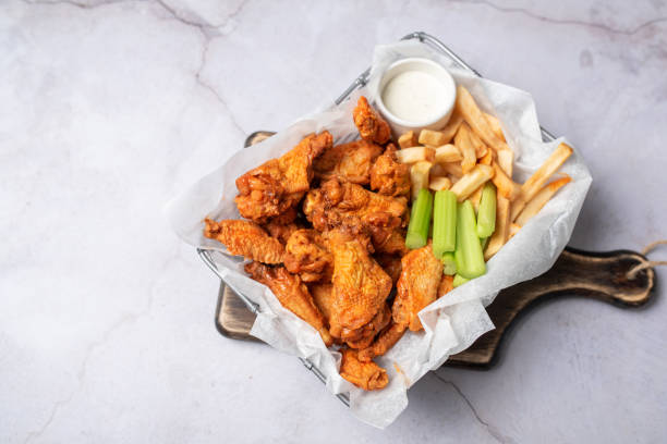 istock Buffalo chicken wings with celery and dip 1469014793