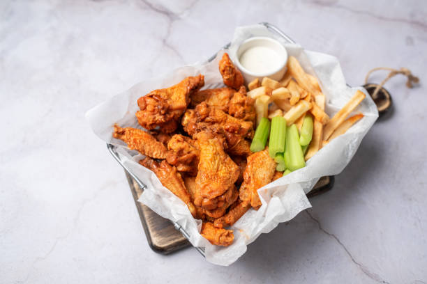 istock Buffalo chicken wings with celery and dip 1469014801