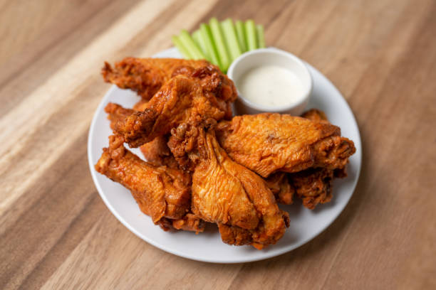istock Buffalo chicken wings with celery and dip 1469014971