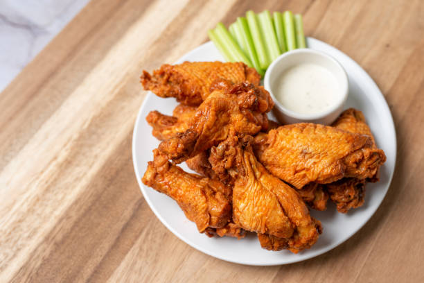 istock Buffalo chicken wings with celery and dip 1469015011