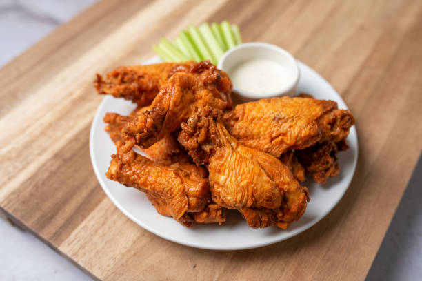 istock Buffalo chicken wings with celery and dip 1469015012