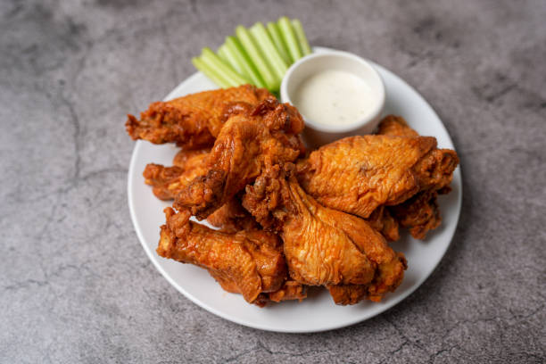 istock Buffalo chicken wings with celery and dip 1469015645