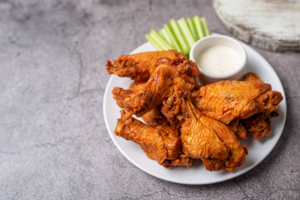 istock Buffalo chicken wings with celery and dip 1469015649