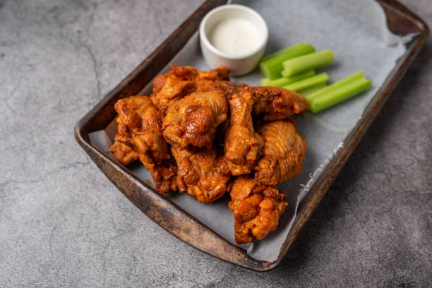istock Buffalo chicken wings with celery and dip 1469015786