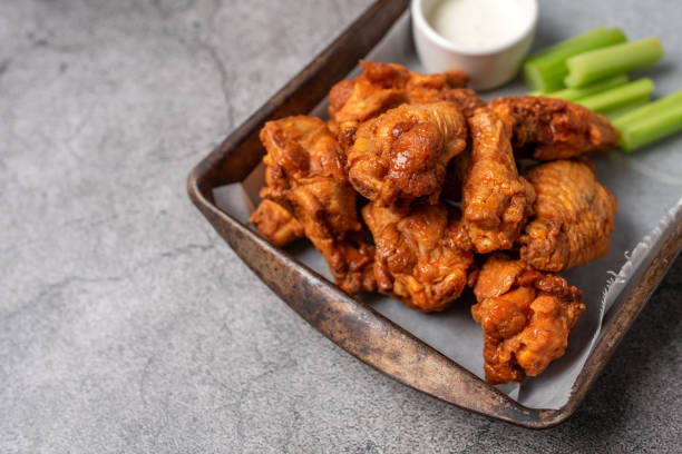istock Buffalo chicken wings with celery and dip 1469015831