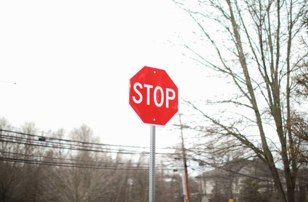 istock Stop sign in public road warning at intersection and law and order 1469023982