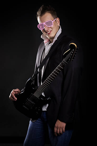istock Portrait of young guitarist 146902639