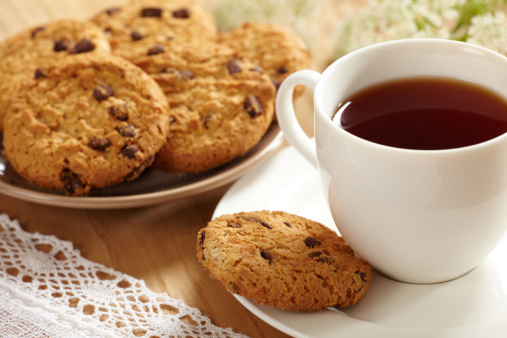 Cup of tea and chocolate cookies