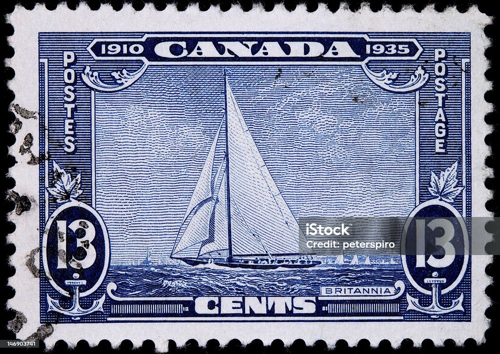 Royal Yacht Stamp Nicely engraved Canadian stamp depicting the royal yacht in 1935, on the 25th anniversary of the reign of King George V. 1935 Stock Photo
