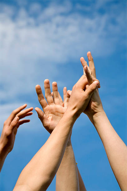 istock hands of young men and the sky 146904010