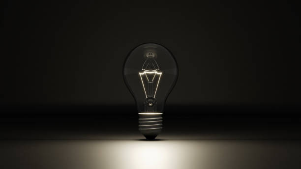 istock 3D illustration of light bulb on black background. (Horizontal) 1469042339