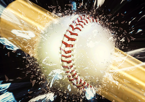 Baseball game, baseball ball sitting on the home plate, base, during the baseball game.