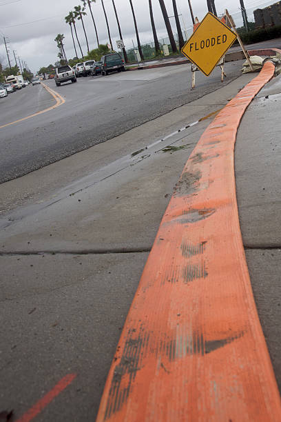 istock Draining hose and Flooded sign 146904634