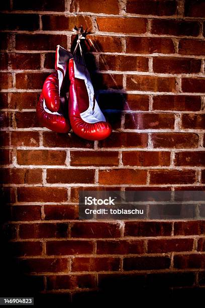 Boxing Gloves Stock Photo - Download Image Now - Brick, Brick Wall, Hanging