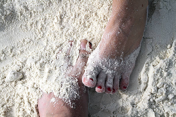 Feets on Beach Playing with white sand on the beach meeru island stock pictures, royalty-free photos & images