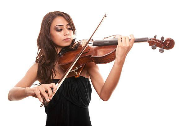 musiker - practicing music violin women stock-fotos und bilder