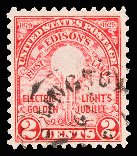 Edison 1929 A 1929 issued 2 cent United States postage stamp showing Thomas Edison's first electric lamp. 1920 1929 stock pictures, royalty-free photos & images