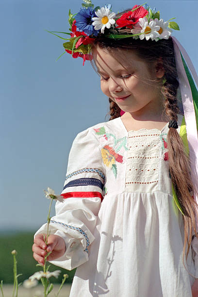 istock little girl on chamomile field 146906730