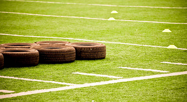 Football Training Equipment Lying on a Practice Field
