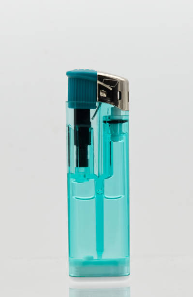 istock Transparent turquoise lighter isolated on white background. 1469073536