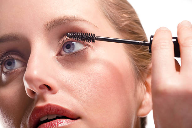 istock Woman applying mascara 146908131