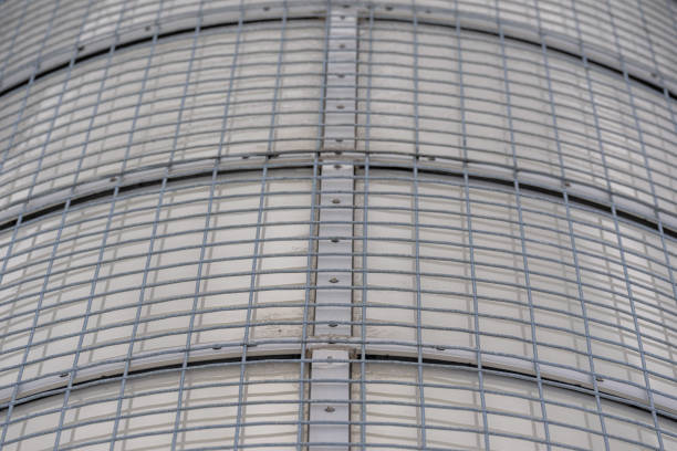 Example of a barrel vault skylight screen fall protection guard installed on a commercial, industrial, or school skylight.