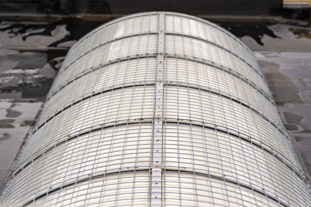 Example of a barrel vault skylight screen fall protection guard installed on a commercial, industrial, or school skylight.