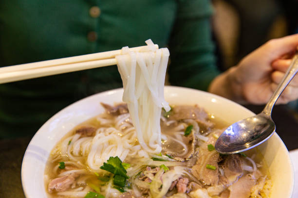 istock Traditional Beef Combination Pho Rice Noodle with Beef Innards, Onion, and Coriander 1469085093