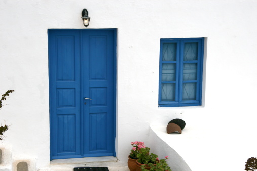 Blue door and window on a house in Santorini, Greece