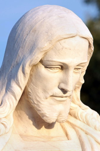 Marble statue of Jesus Christ in a cemetery