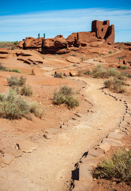 Trail through Wupatki National Monument Winding Trail at Wupatki National Monument kayenta photos stock pictures, royalty-free photos & images