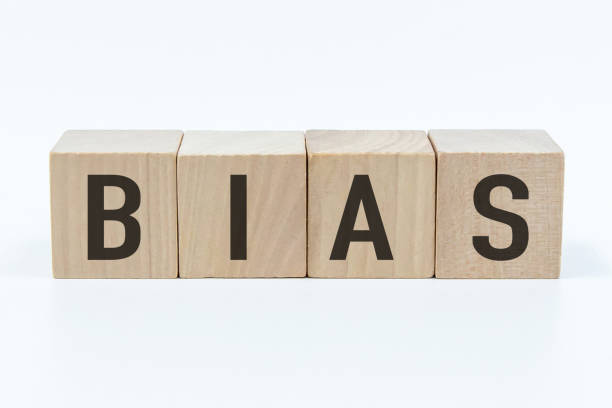 istock Bias word on wooden block with white backgrounds. 1469100501
