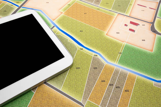 istock Buildings Permit concept with rural cadastral map and General Urban Plan - building activity and construction industry concept with a digital tablet - image with copy space 1469101004