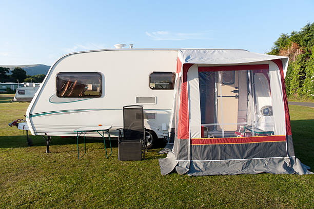 istock Caravan with porch awning on sunny sumer day 146910137