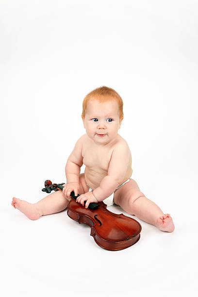 istock The child playing with a violin 146910506