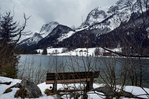 Empty bench with beautiful alpine view
