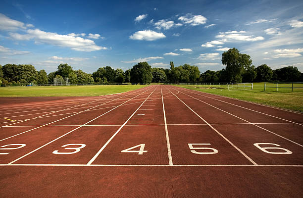 Starting positions on empty running track stock photo