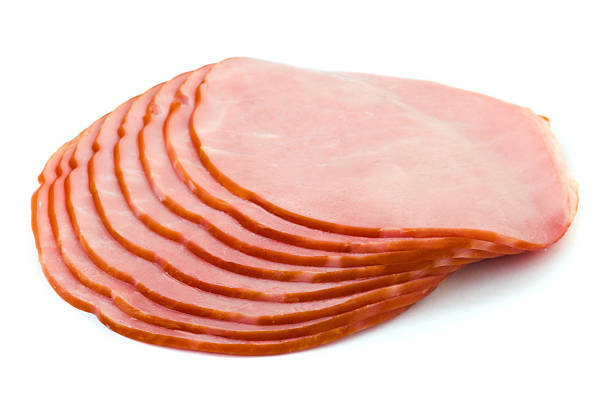 istock Pile of sliced ham against white background 146910948
