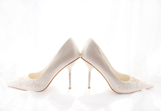 Wedding shoes on white stock photo