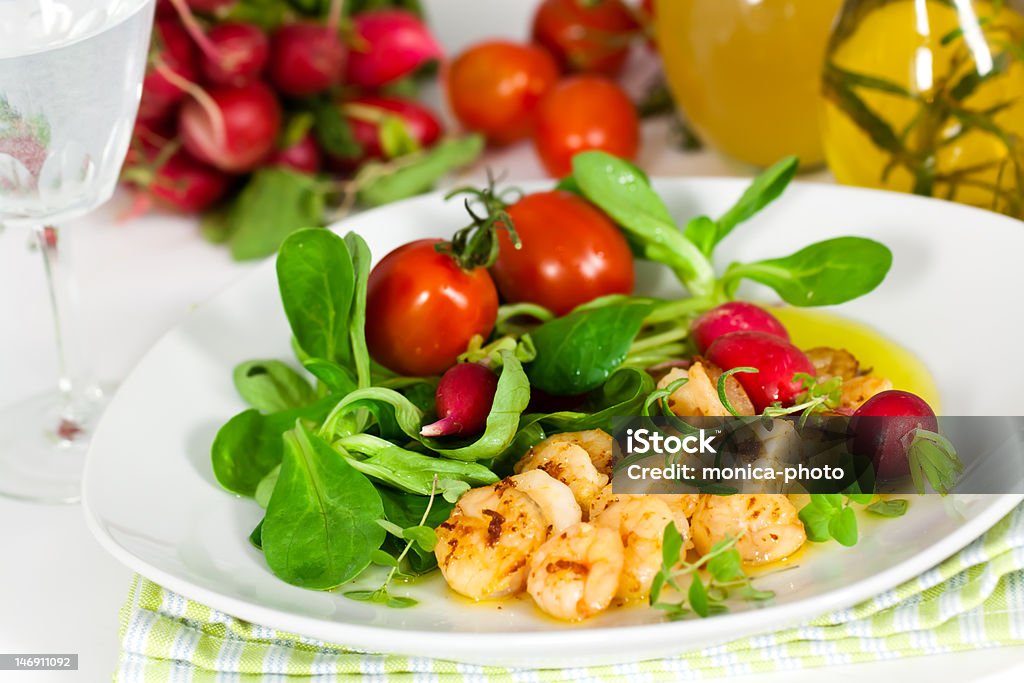 Roasted prawns with corn salad,cherry tomatoes and sauce Roasted prawns with corn salad,cherry tomatoes and sauce. Appetizer Stock Photo