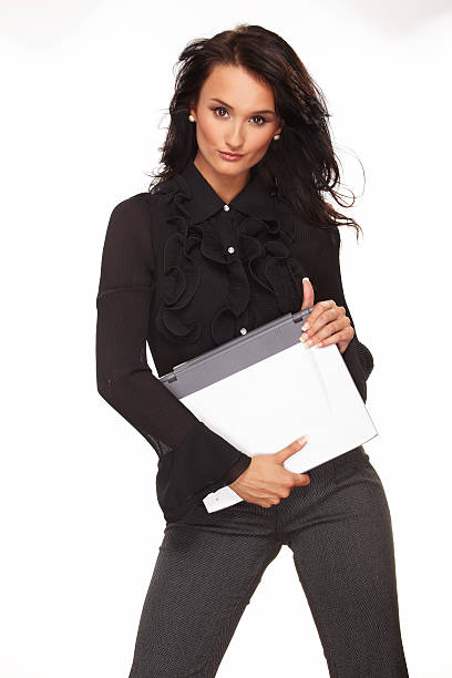Mujer de negocios con computadora portátil - foto de stock