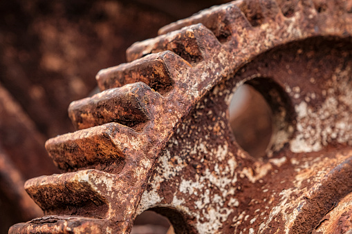 The ravages of time. Close-up of a rusted gear wheel.