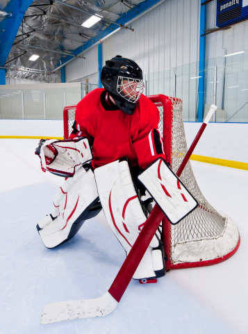 Ice hockey goalie. Picture taken in ice arena.