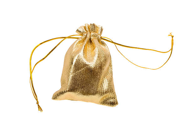 istock Close-up of a gold gift bag isolated on white 146912820