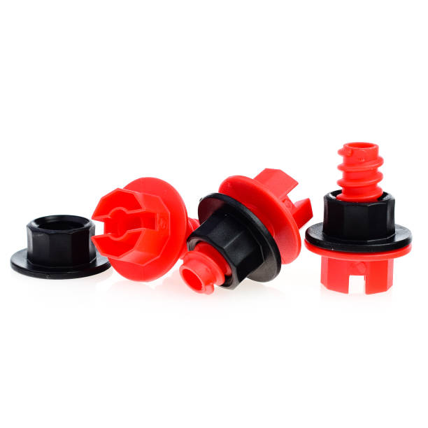istock Plastic children's construction kit isolated on a white background. Children's nuts and screws are red. Builder's kit. Wrench 1469130136