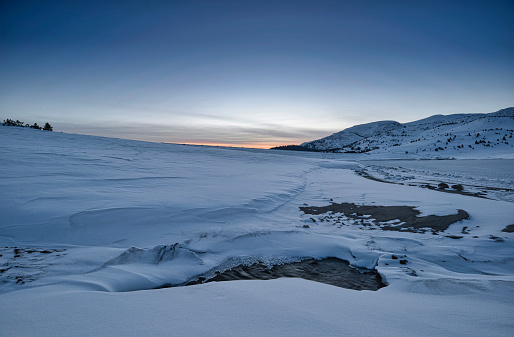 Belmeken Dam wintertime at sunset. Bulgaria, Europe.