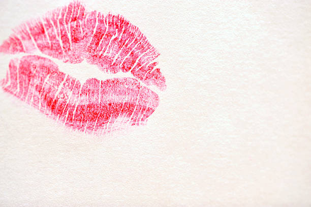 istock pink lipstick kiss on paper 146913404