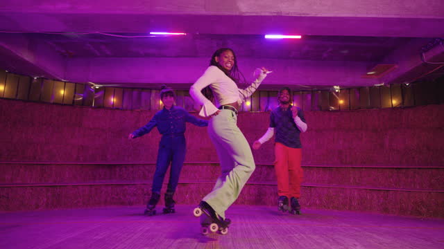 Young Black roller skater showing freestyle moves